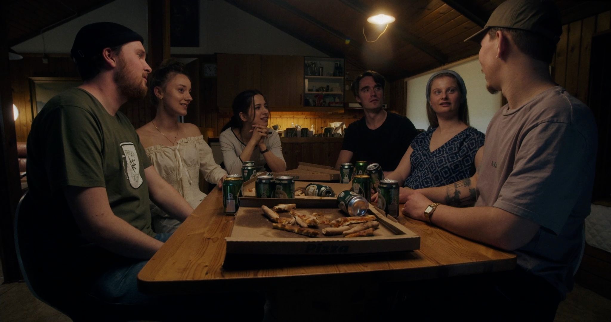 Still from Tidskapslen featuring young people around a table